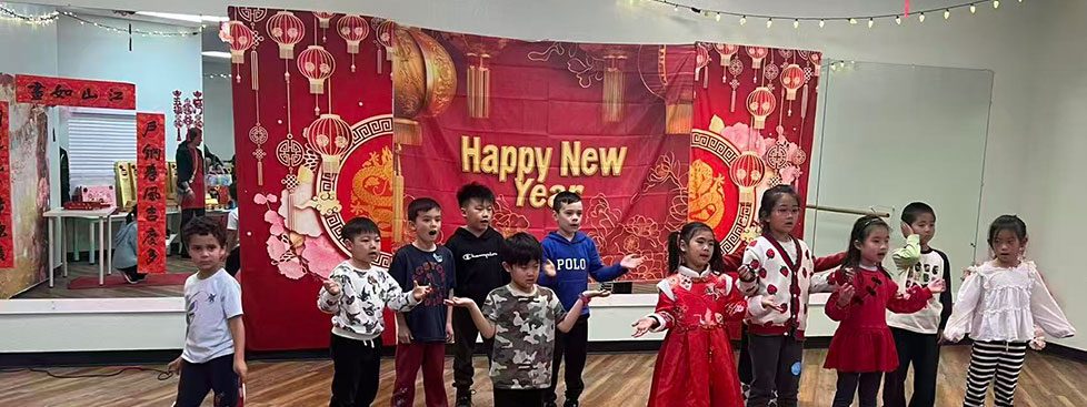 Students performing together at the Lunar New Year celebration