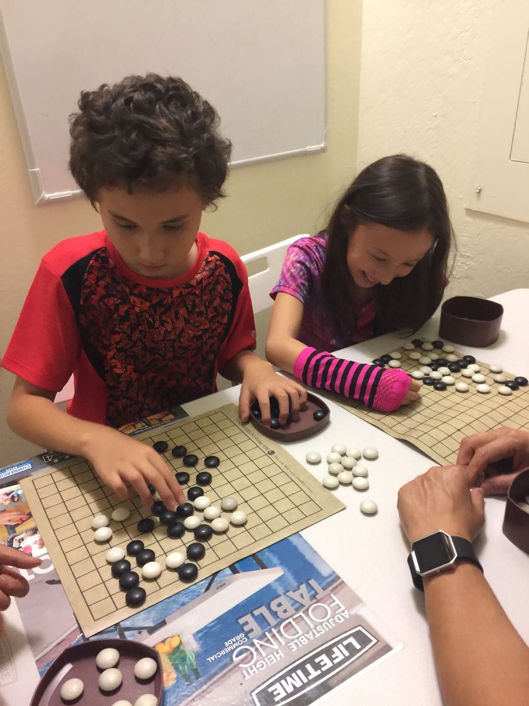 Students learning together in an after-school classroom
